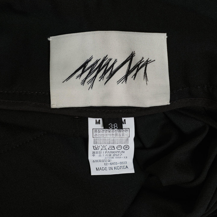 Club21 - MMAM - Relaxed Mid-Waist Pleated Trousers - PANTS - Black