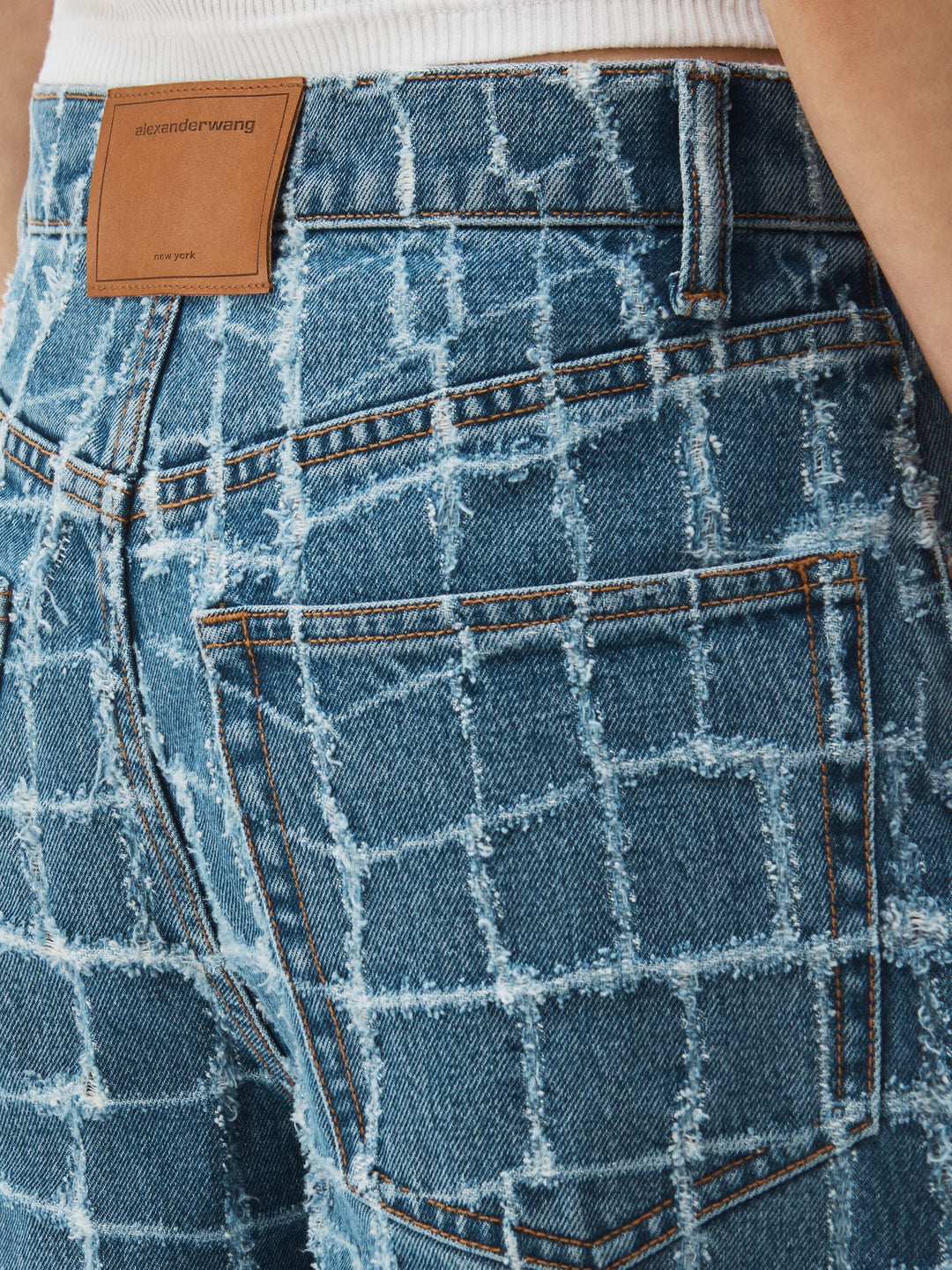 Laser-Distressed Denim Jeans