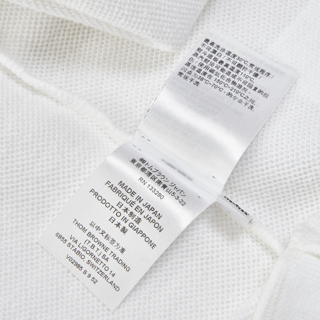 Thom Browne Short Sleeve Raglan Pullover – Available at Club 21, Official Retailer in Singapore, Malaysia & Thailand with Global Shipping Online