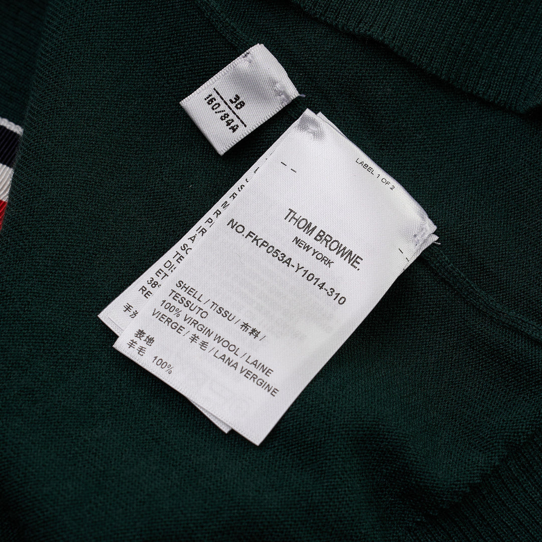 Thom Browne hunter green fine-knit polo with four-bar white stripe on sleeve, button placket, ribbed cuffs and hem