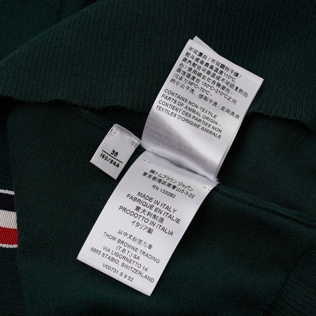 Thom Browne hunter green fine-knit polo with four-bar white stripe on sleeve, button placket, ribbed cuffs and hem