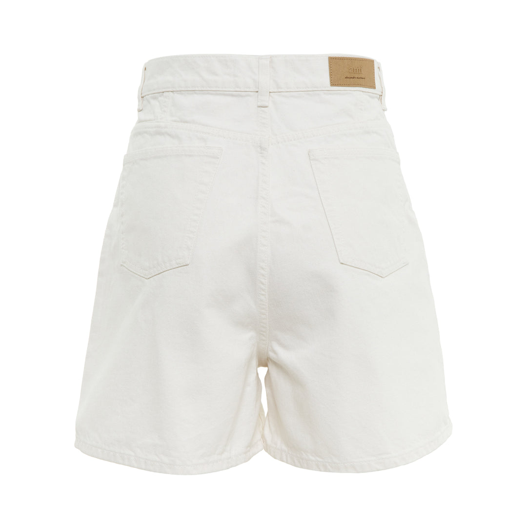 AMI Paris Heritage Denim Shorts in off-white with high-rise waist, five-pocket design, and signature heritage label patch