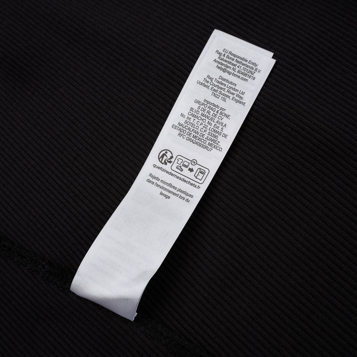 rag & bone Essential Rib Muscle Tank in black, featuring a high racer neckline, fine ribbed knit fabric, and a form-fitting sleeveless silhouette, shown on a flat lay against a white background - view 5