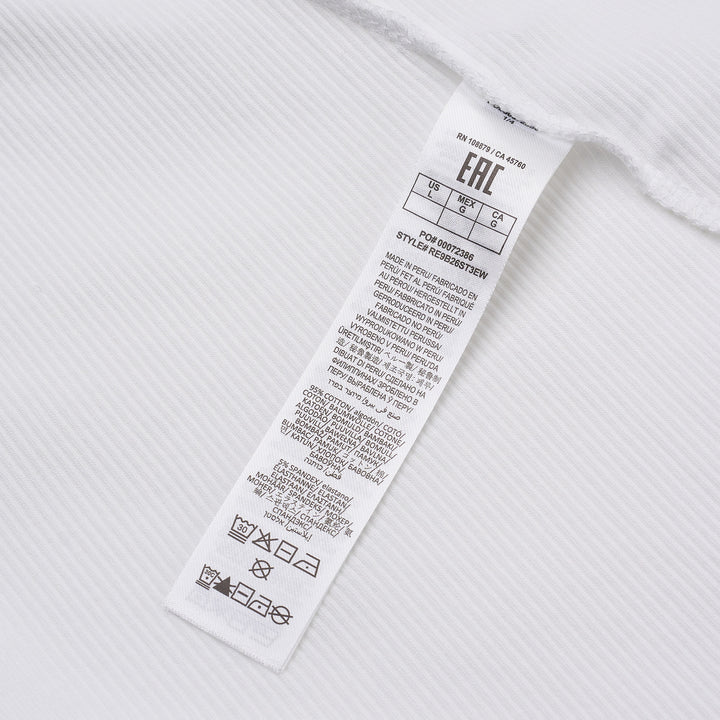 rag & bone Essential Rib Long Sleeve Crew in white, featuring a slim ribbed silhouette, elevated crew neckline, and ribbed cuffs
