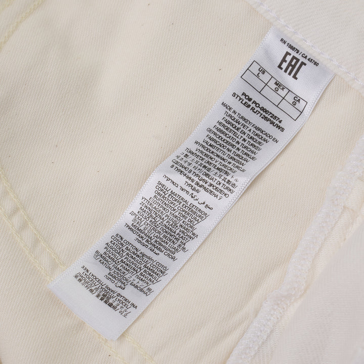 rag & bone Nolan Shorts in ivory white denim with scalloped hem, self-tie drawstring waist, and silver-tone rivets, front view