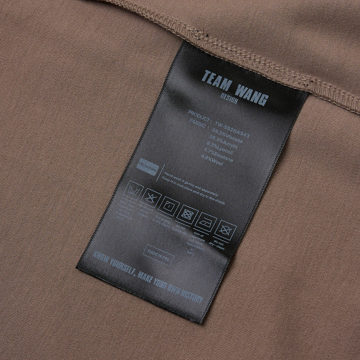 TEAM WANG design Reset Fitted Tee in black, featuring a tonal centre-front vertical seam, crew neckline, and short cap sleeves, displayed flat on a white background