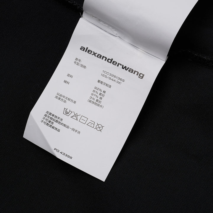 Alexander Wang white fitted crew-neck tee with hotfix crystal 'alexanderwang' logo text arranged in a radiating pinwheel sunburst pattern across the chest