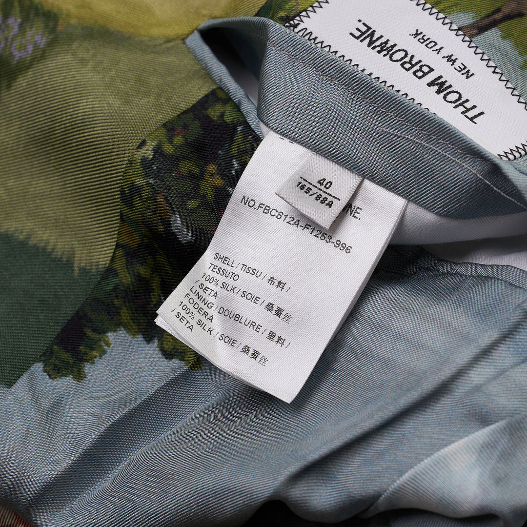 Thom Browne High Armhole Sportcoat with all-over New England coastal folk-art landscape print featuring lighthouses, cottages, vintage cars, and beach scenes, two-button closure, notch lapel, made in Italy