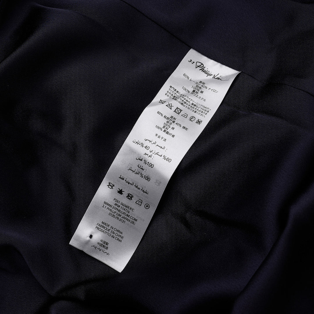 3.1 Phillip Lim black fil coupé textured organza belted midi skirt with A-line silhouette, D-ring belt, and woven hem border