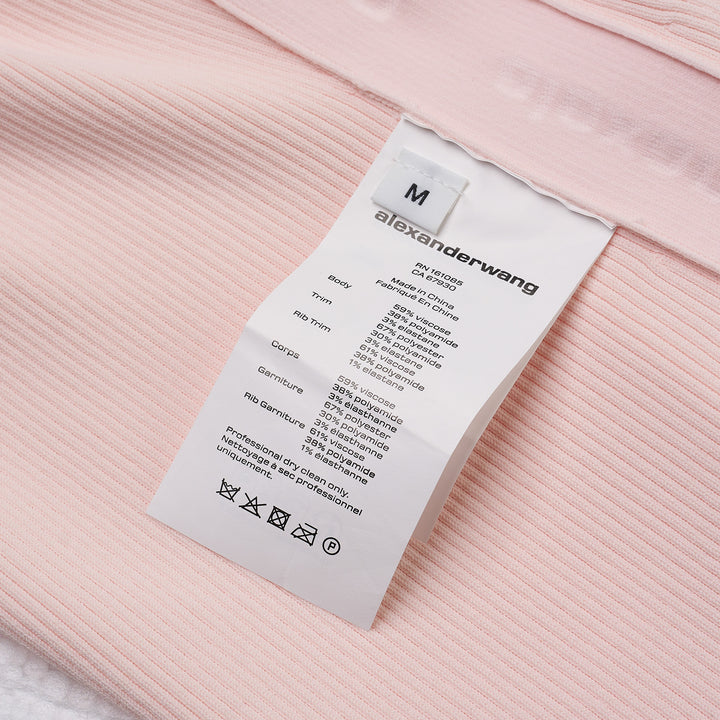 Alexander Wang Logo Track Stripe sleeveless ribbed knit tank top in pale blush pink with a mock neckline, front view