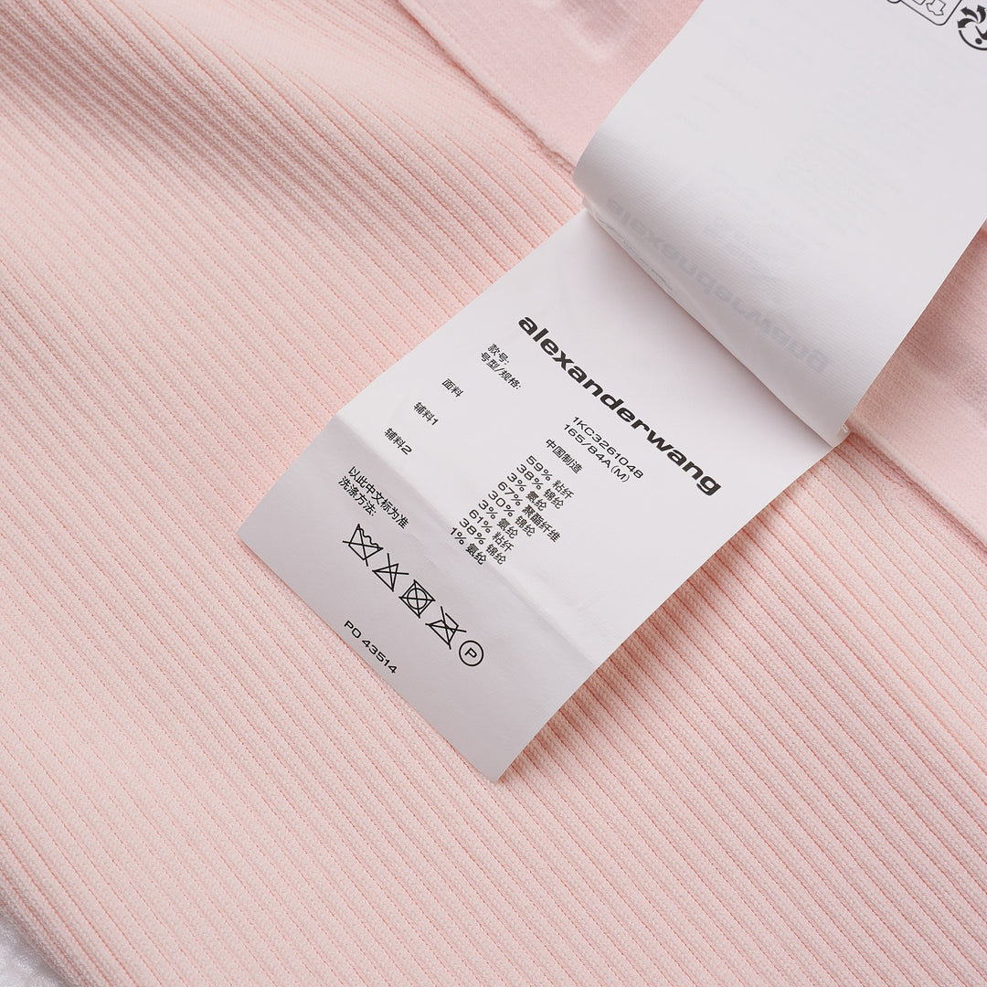 Alexander Wang Logo Track Stripe sleeveless ribbed knit tank top in pale blush pink with a mock neckline, front view