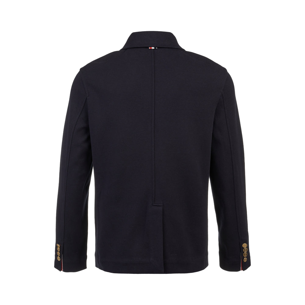 Thom Browne Car Jacket in navy compact Milano knit with gold engraved buttons, chest patch pocket, two lower patch pockets, and spread collar, displayed flat on white background - view 2