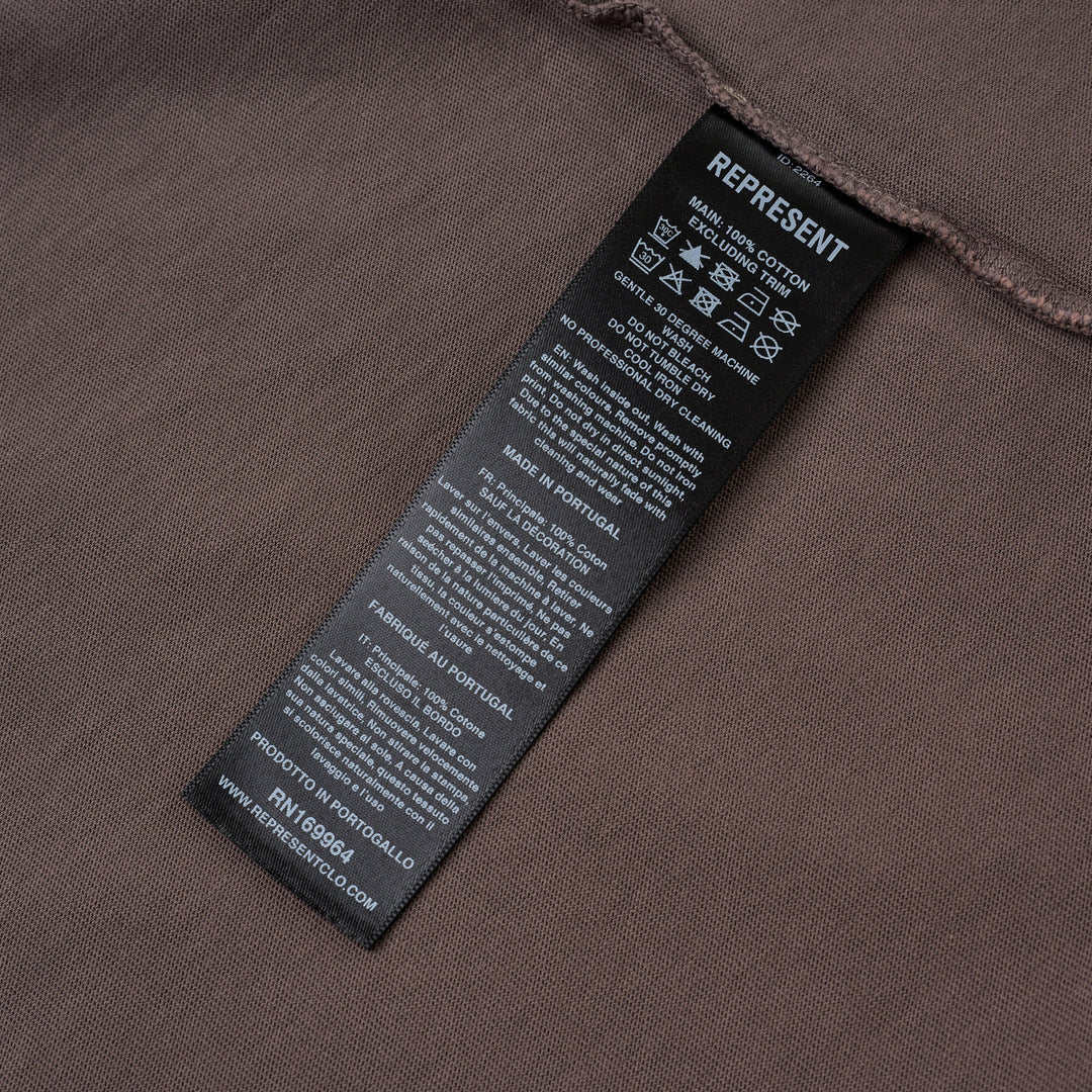 Represent Owners Club Script T-Shirt in washed taupe with tonal chest logo print, oversized boxy fit and mock neck collar