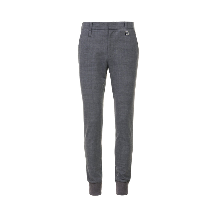 Wooyoungmi Elastic Waist Slim Pants in grey mélange fabric with ribbed knit cuffs and metal hardware detail at the waistband, front view