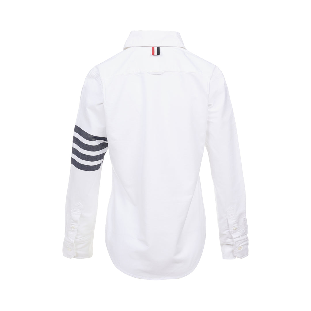 Thom Browne white oxford long sleeve shirt with rounded collar, button-front placket, single chest pocket, and signature four-bar grey stripe across one sleeve - view 2