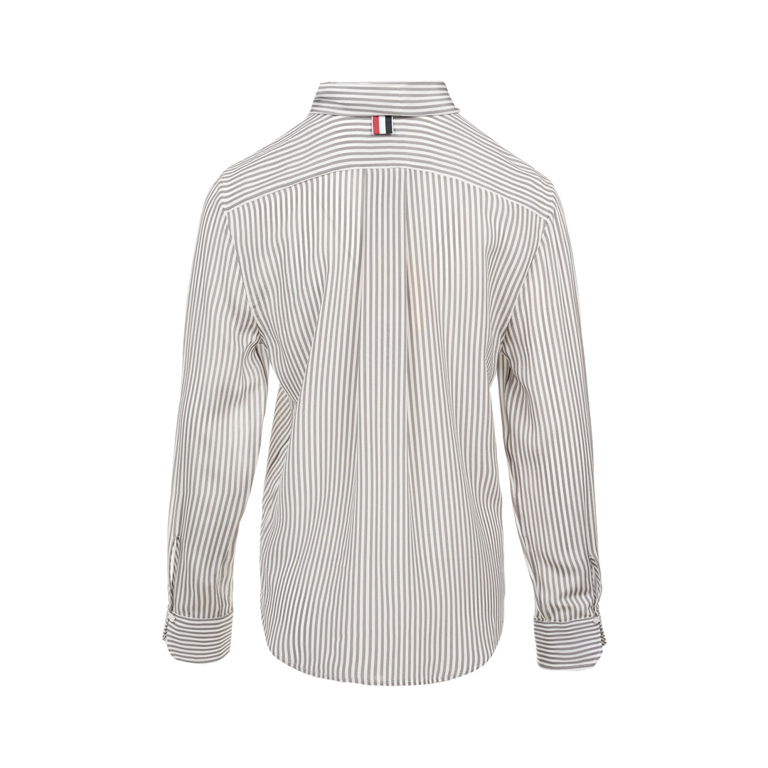 Thom Browne grey and white vertical stripe long sleeve blouse with detachable pussy-bow collar, contrast horizontal-stripe cuffs, and signature woven label patch at the hip - view 2