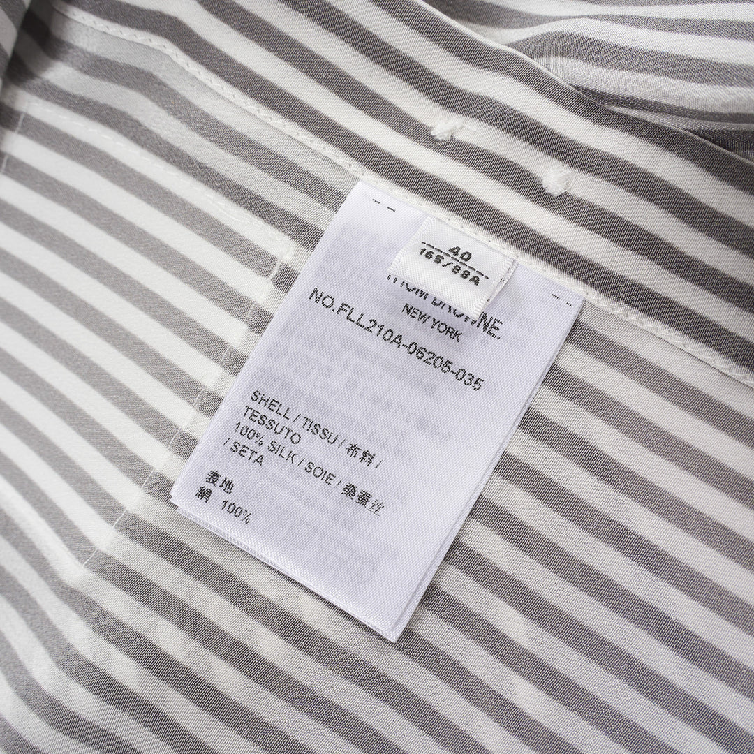 Thom Browne grey and white vertical stripe long sleeve blouse with detachable pussy-bow collar, contrast horizontal-stripe cuffs, and signature woven label patch at the hip - view 3