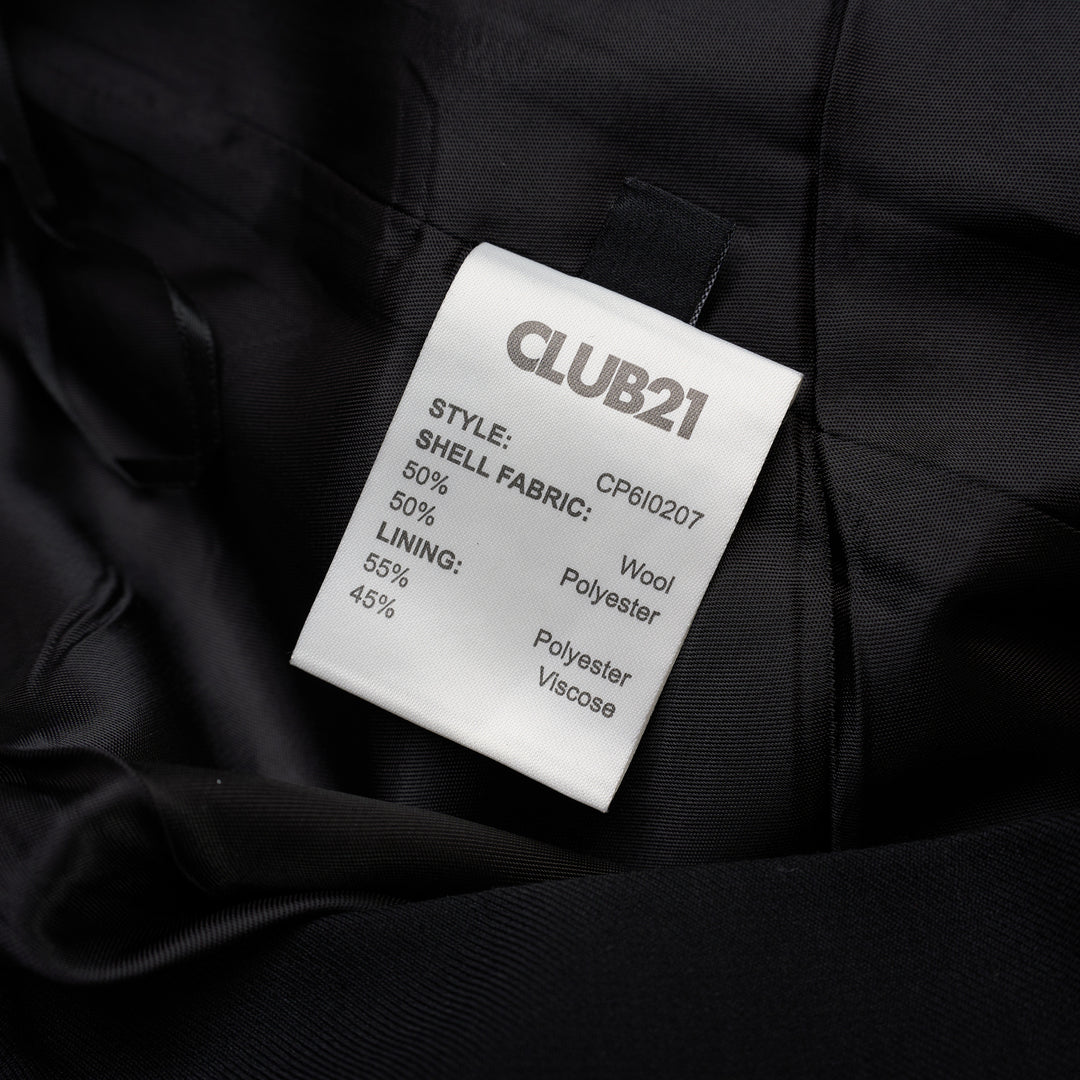 Club21 Collection Lila layered wool blend trousers with a tailored mini skirt overlay and wide-leg silhouette, front view - view 4