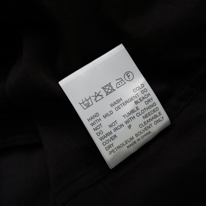 Black sheer silk-cotton Soline shirt with pleated tuxedo-style bib, pointed collar, concealed placket and long sleeves - view 4