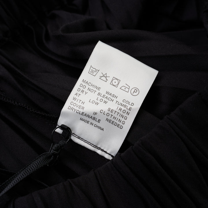 Black pleated midi skirt with elasticated waist and asymmetric handkerchief hem by Club21 Collection - view 3