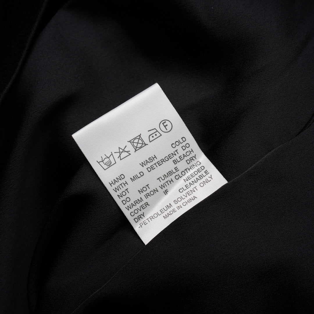 Black high-waisted maxi skirt in crepe acetate mix with tailored waistband and belt loops, shown from the front - view 3