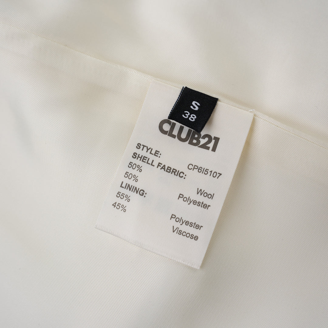 Cream wool-blend tailored vest with V-neckline, five tortoiseshell-effect buttons and two flap pockets, shown from the front - view 3