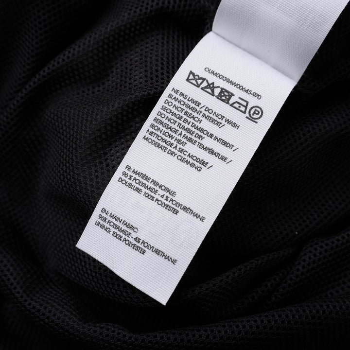 Jacquemus Le Coupe-Vent charcoal grey zip-up windbreaker with collar, elasticated cuffs and hem, and embroidered gold monogram on the chest - view 3