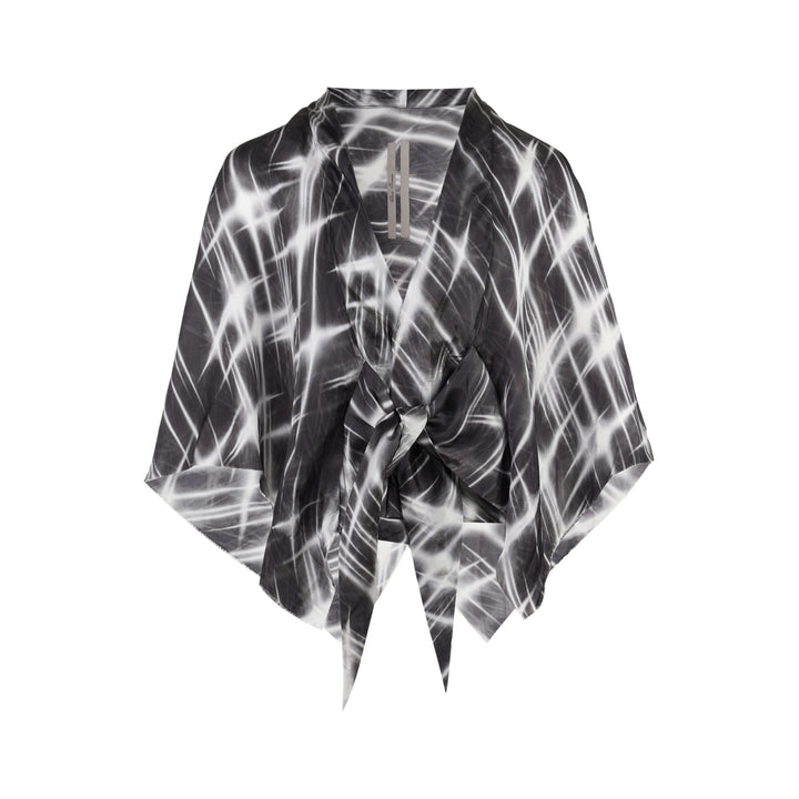 Rick Owens Half Moon wrap top in a black and white starburst print with a kimono-style silhouette and knotted tie front