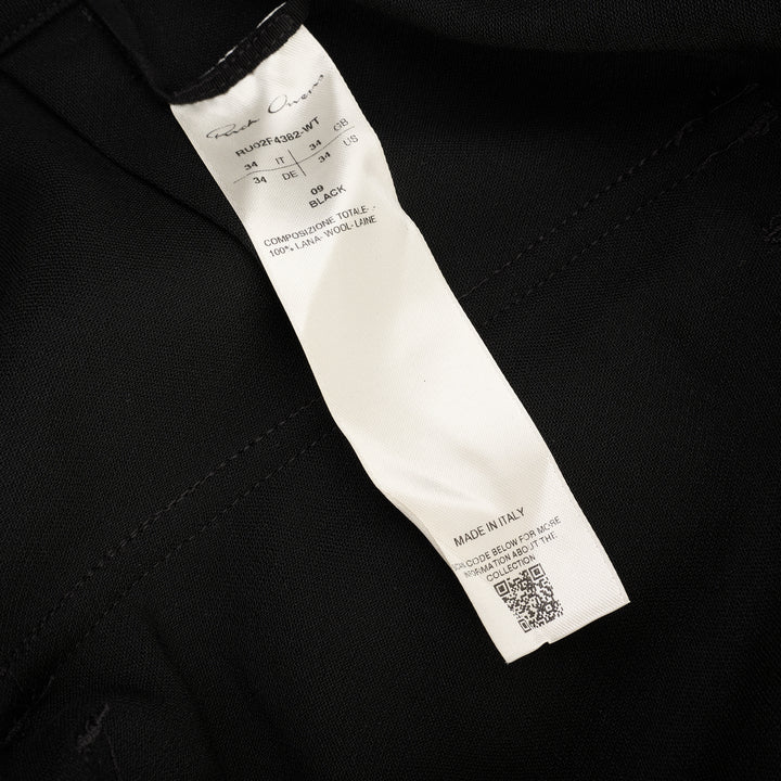 Rick Owens Stefan Cargo Twisted Shorts in black, featuring oversized patch pockets, raw-hem leg openings, and a silver snap button fastening at the waistband - view 3