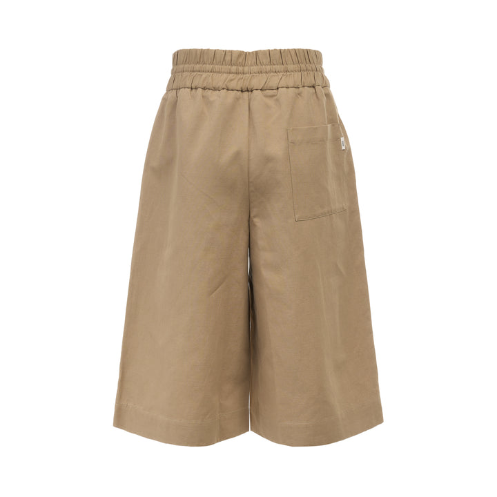 AMI Elasticated Large Bermuda Shorts in khaki tan, featuring a wide-leg silhouette, elasticated paper-bag waistband with drawstring, and hem side slits, displayed flat on a white background - view 2