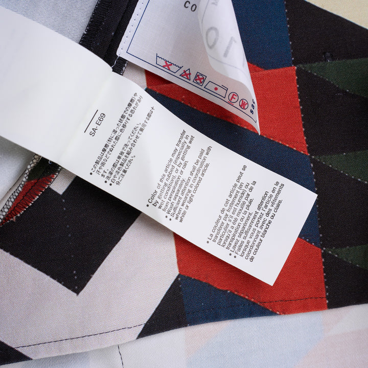 sacai x A.P.C. Quilts short sleeve shirt with a multicolour geometric arrow print, camp collar, button front and two flap chest pockets - view 6