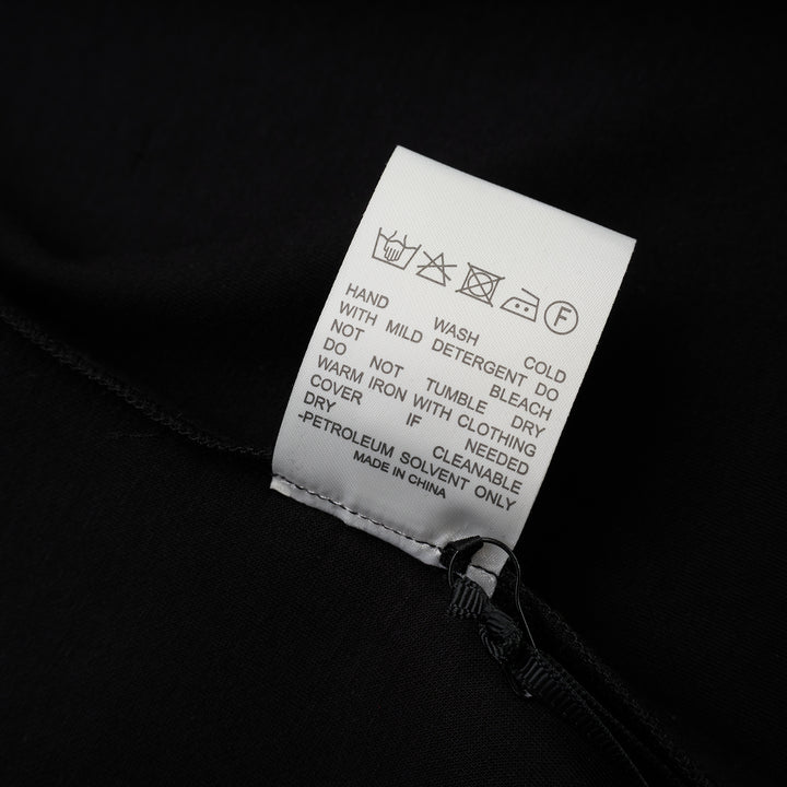 Black long sleeve zip-front top in high stretch modal jersey with a crew neckline and vertical front seams - view 4