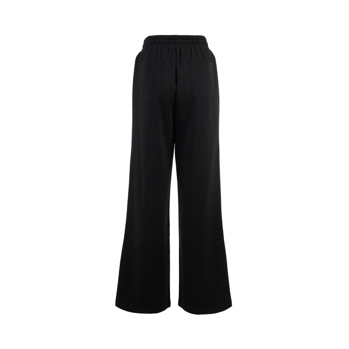 Black wide-leg Lena pants in high-stretch modal jersey with an elasticated drawstring waistband, shown from the front - view 2