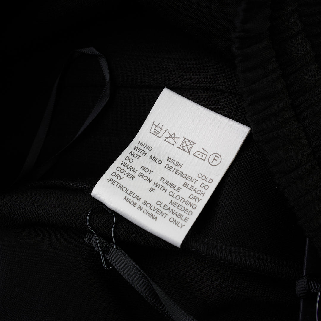 Black wide-leg Lena pants in high-stretch modal jersey with an elasticated drawstring waistband, shown from the front - view 3