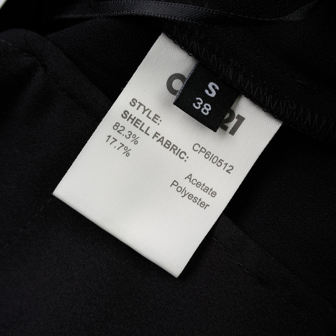 Black wide-leg cargo pants in crepe acetate mix with flap side pockets and panelled front, shown from the front - view 3