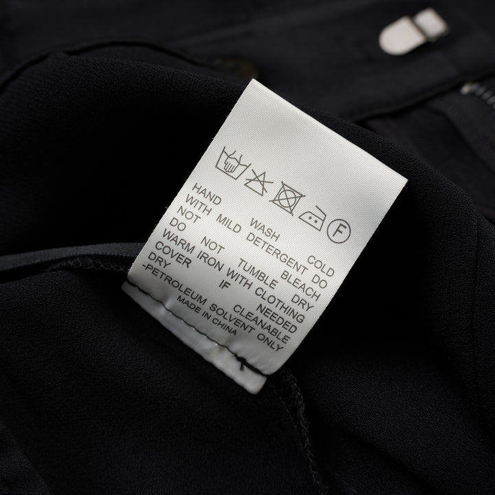 Black wide-leg cargo pants in crepe acetate mix with flap side pockets and panelled front, shown from the front - view 4