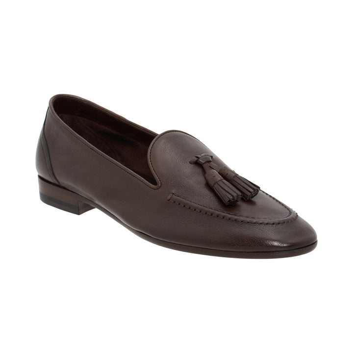 The Row Caden loafer in brown grained leather with leather tassel, moccasin stitching and low stacked heel, side view - view 2