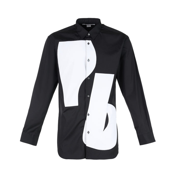 Comme des Garçons Shirt black long sleeve button-up shirt with curved white patchwork panels on the front