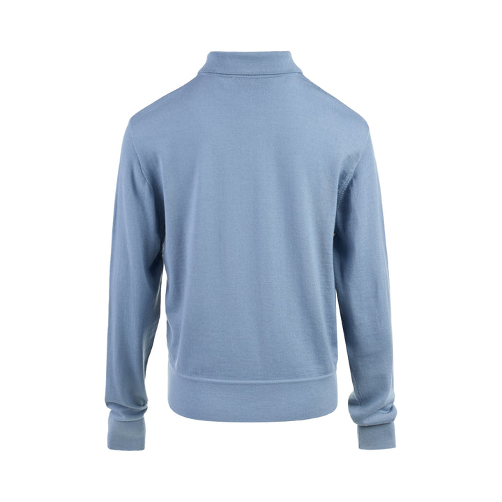 Zimmermann Valiant long sleeve polo with a silk front panel printed with a vintage world map and aeroplanes, framed by blue knit collar, sleeves, and hem - view 2