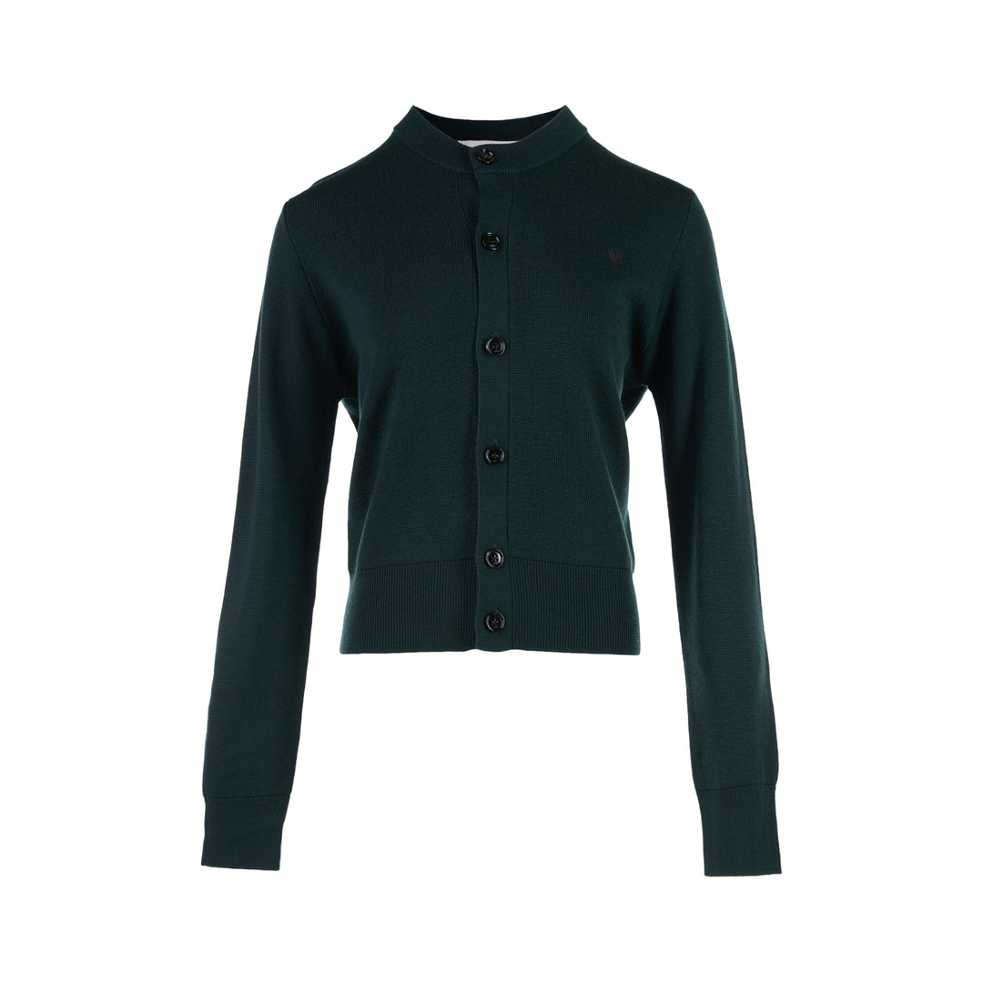 AMI Quota crewneck cardigan in deep forest green with black buttons, ribbed hem and cuffs, and a tonal embroidered heart logo on the chest