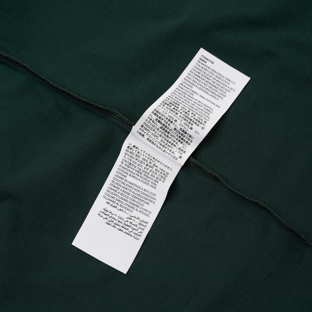 AMI forest green short-sleeve crew neck T-shirt with a small black Ami de Cœur embroidered logo at the chest - view 4