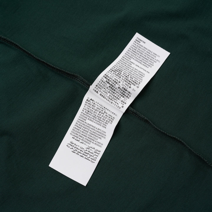 AMI forest green short-sleeve crew neck T-shirt with a small black Ami de Cœur embroidered logo at the chest - view 4