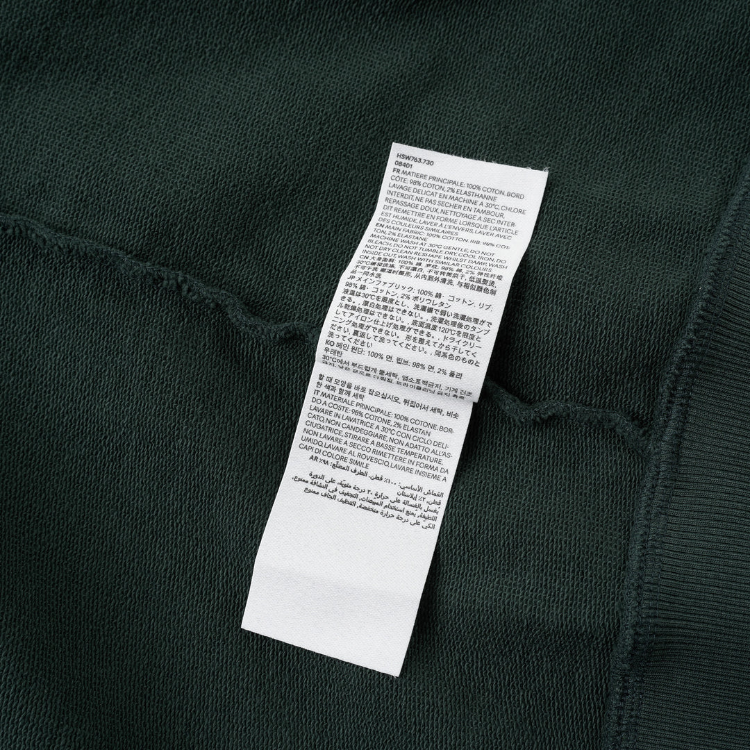AMI forest green crewneck sweatshirt with ribbed trim and a small embroidered Ami de Coeur logo at the chest - view 3