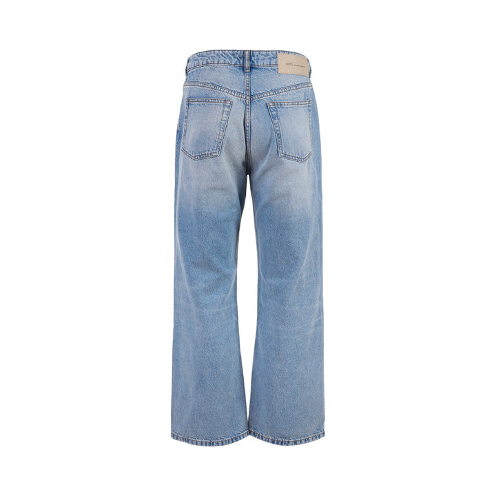 AMI large fit jeans in light washed blue denim with a wide straight leg, five-pocket design and button fly, shown front view - view 2