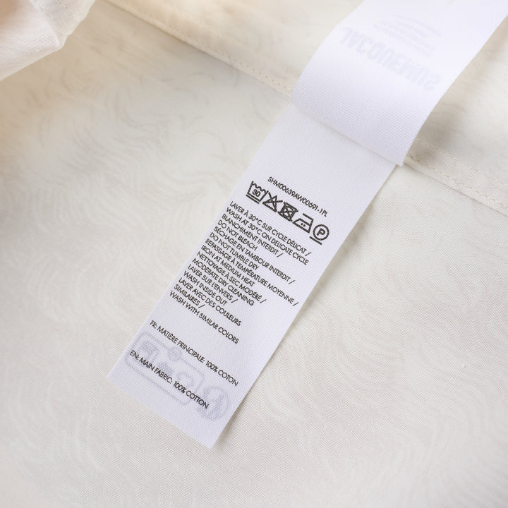 Jacquemus La Chemise Pisco long sleeve cream shirt with tonal poodle print across the front and button placket - view 3