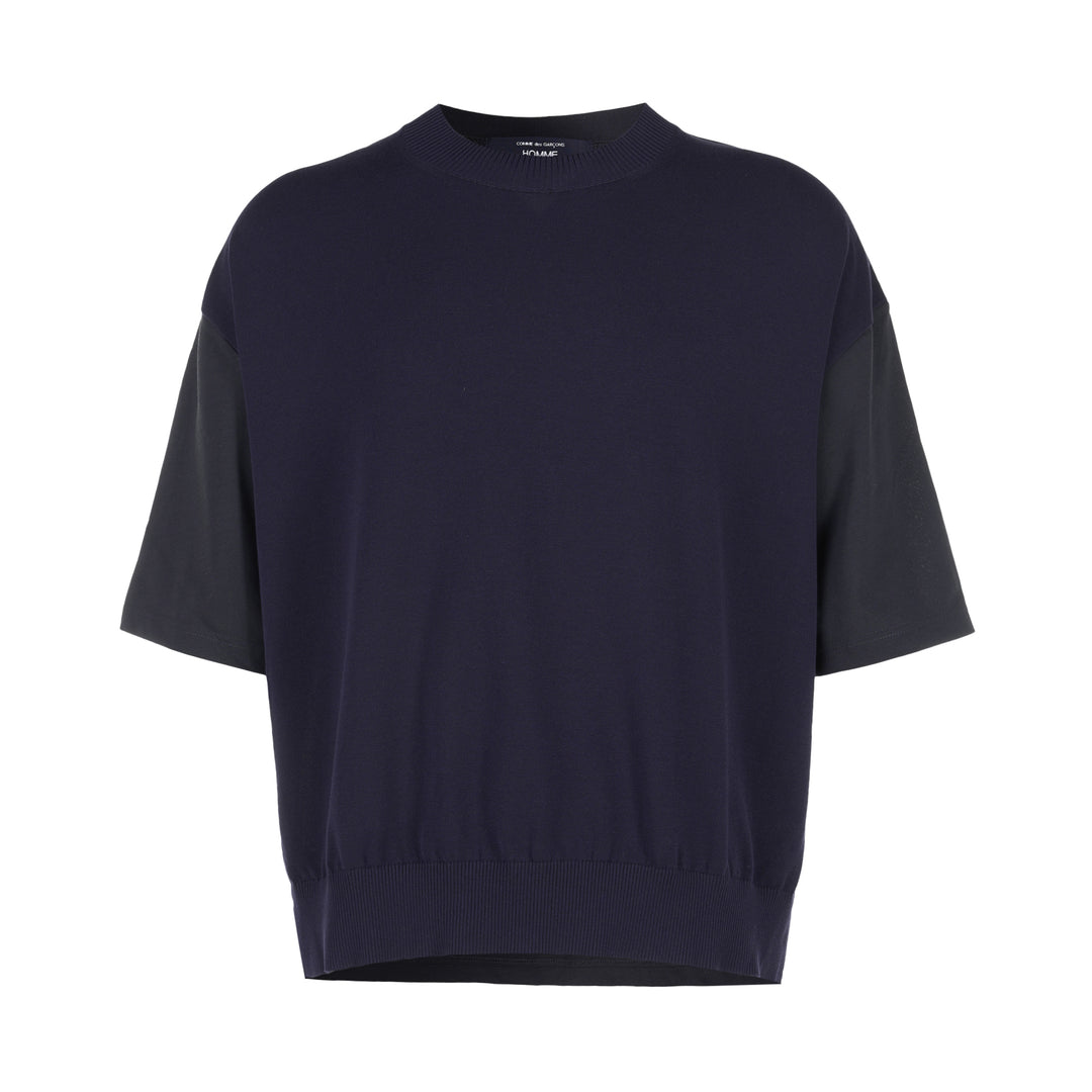 Comme des Garçons Homme navy fine-knit tee with contrasting black short sleeves, ribbed crew neck and hem, shown flat from the front