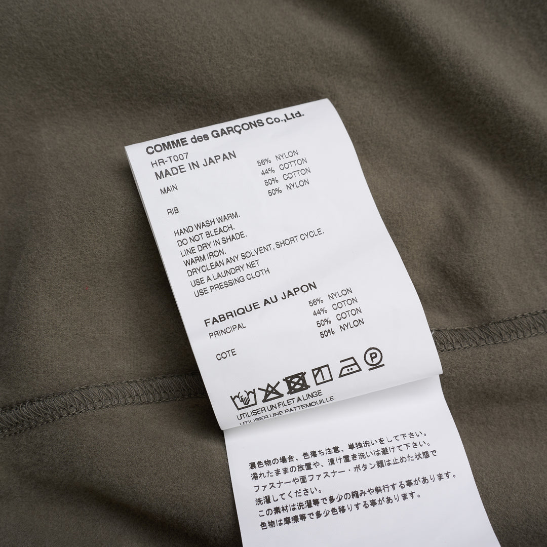 Comme des Garçons Homme olive green snap button cardigan with ribbed V-neck, sleeve zip pocket and ribbed hem - view 3