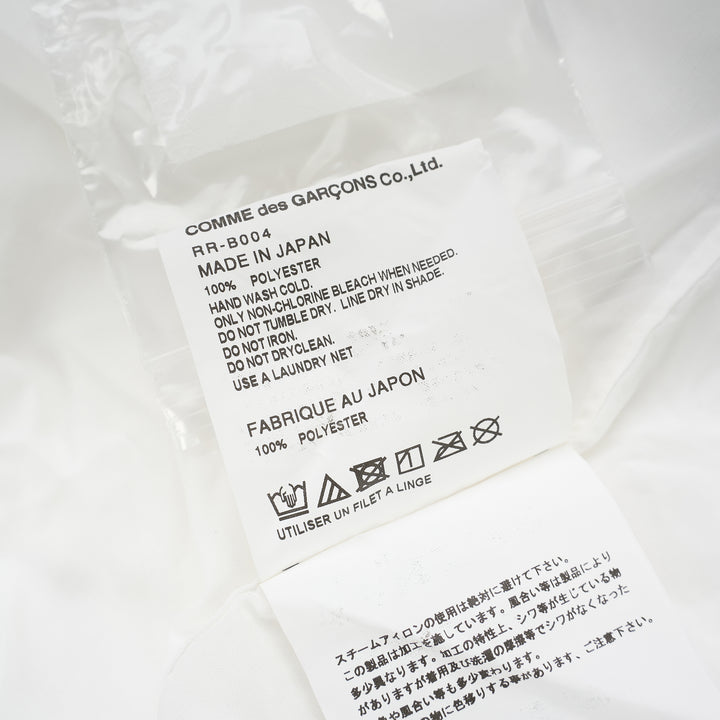 Comme des Garçons Comme des Garçons white longline shirt with raw-edge panel seams, chest pocket and button-through front - view 3