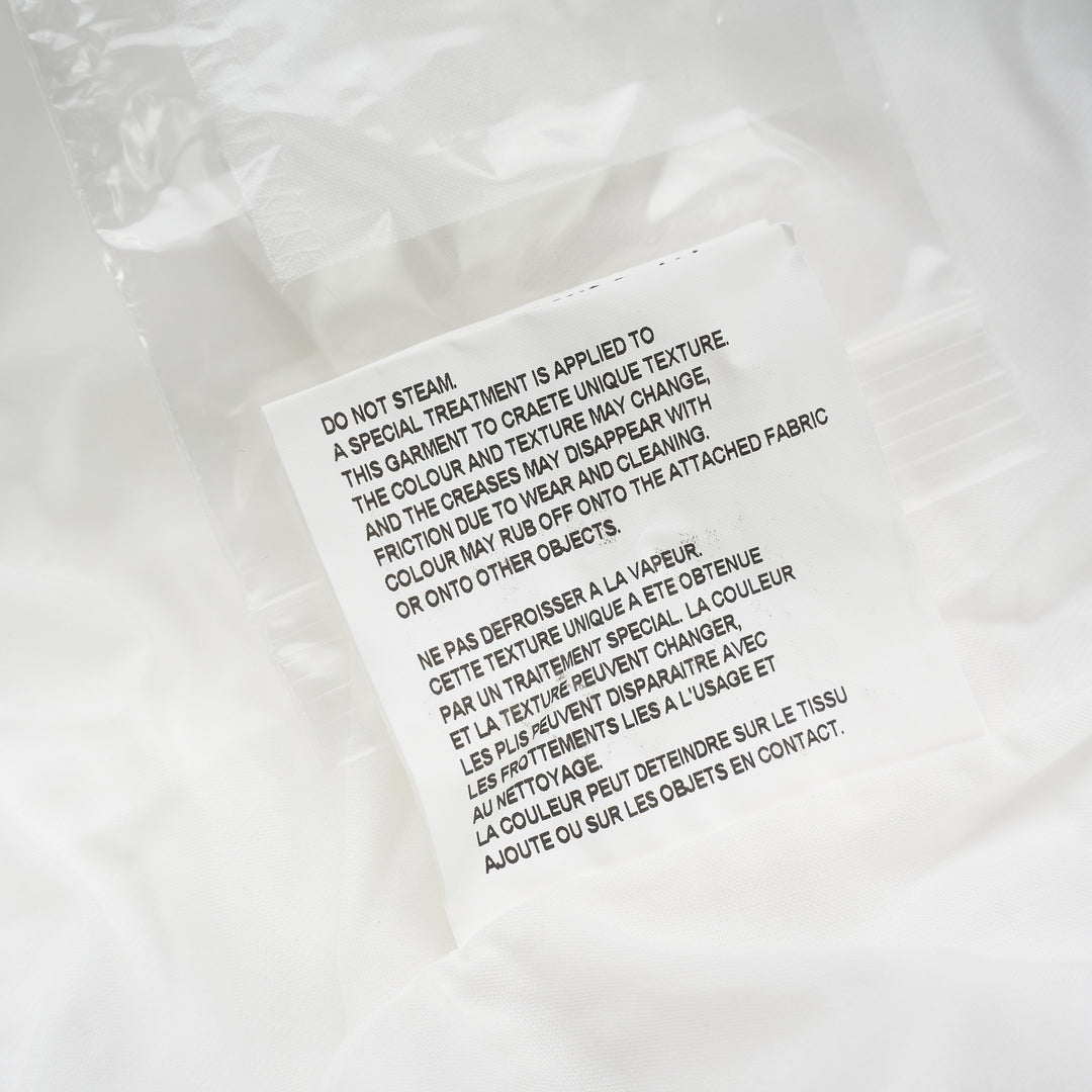 Comme des Garçons Comme des Garçons white longline shirt with raw-edge panel seams, chest pocket and button-through front - view 4