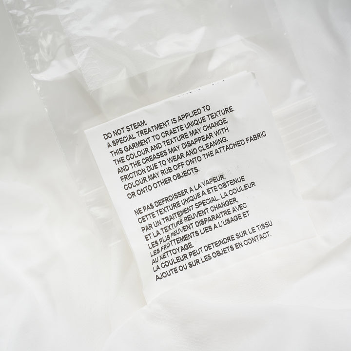 Comme des Garçons Comme des Garçons white longline shirt with raw-edge panel seams, chest pocket and button-through front - view 4
